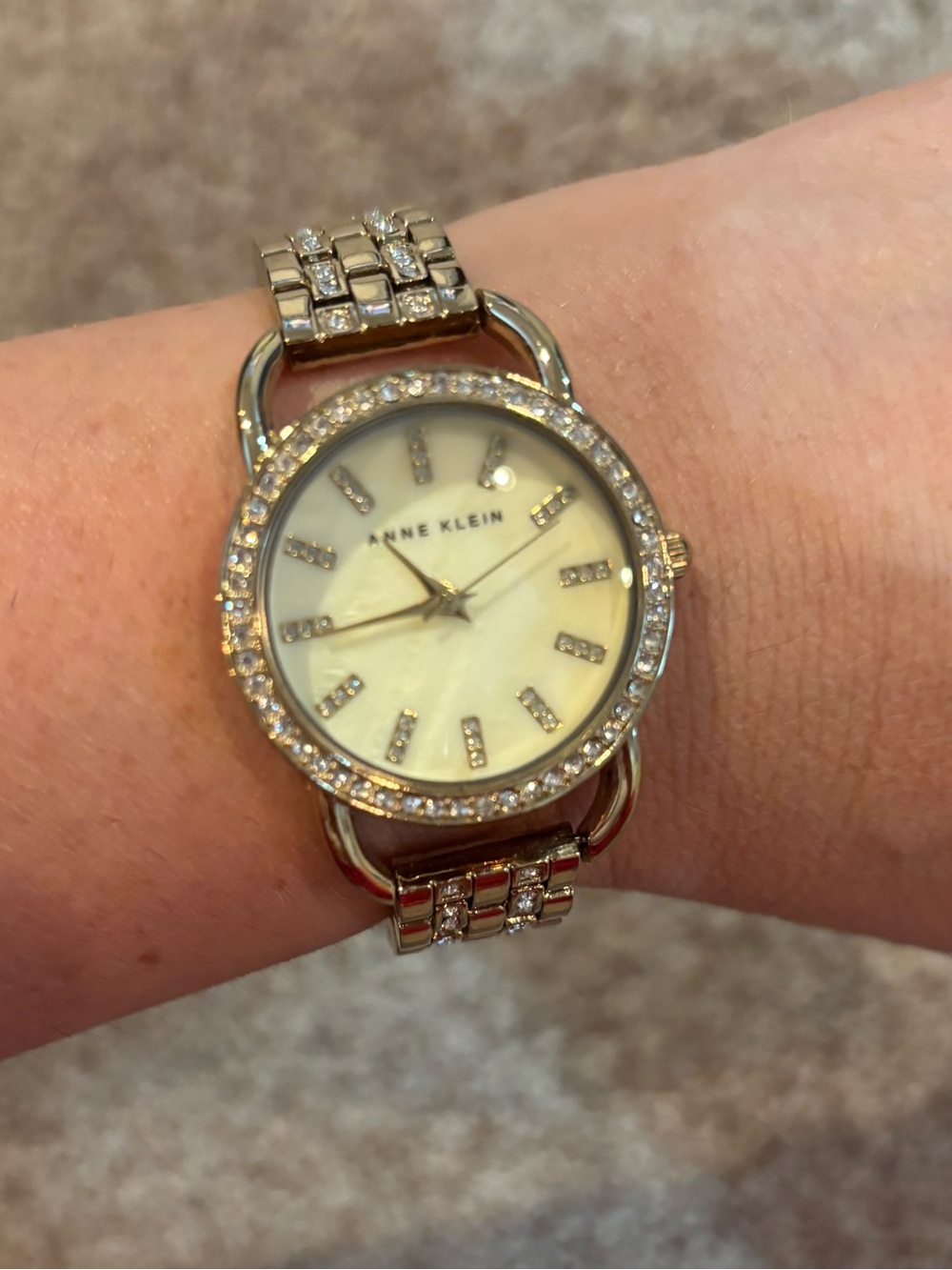 Anne Klein Gold-Tone Crystal Accent Watch with Mother-of-Pearl Dial